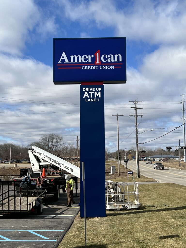 American 1 Credit Union pylon sign in Jackson, MI