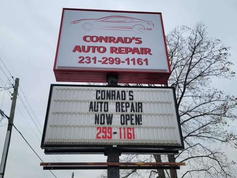 Conrad's Auto Repair pylon sign in Manistee, MI